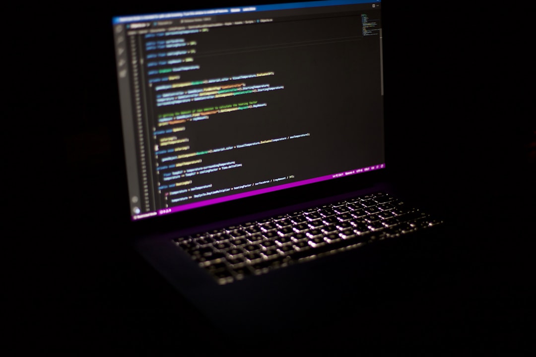 a laptop computer sitting on top of a table