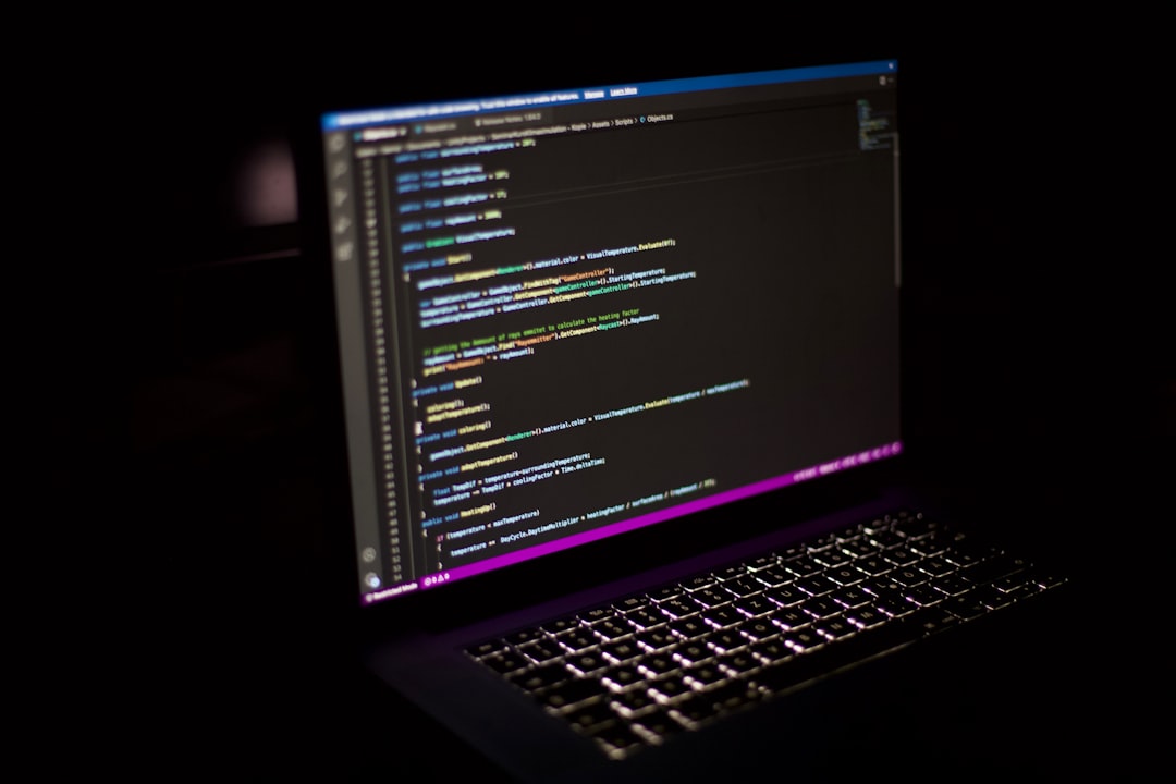 a laptop computer sitting on top of a desk
