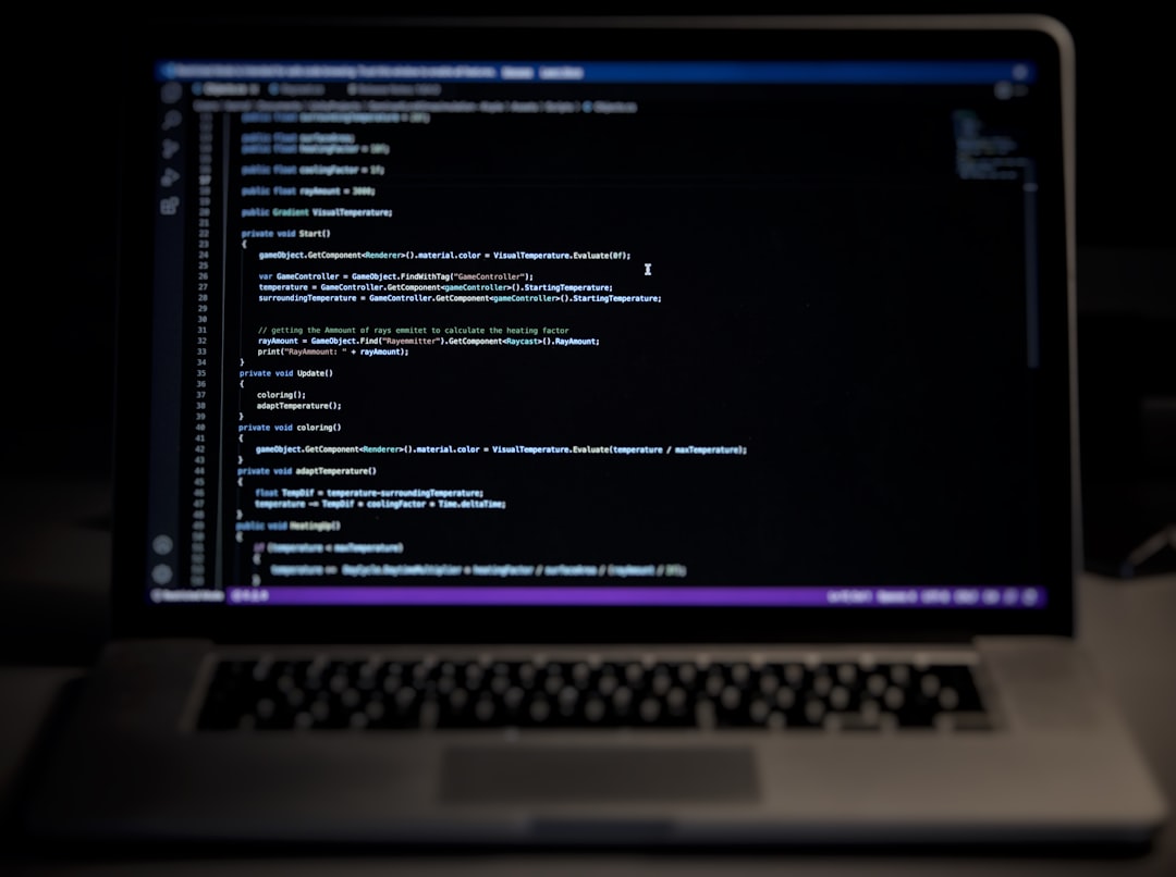 a laptop computer sitting on top of a desk